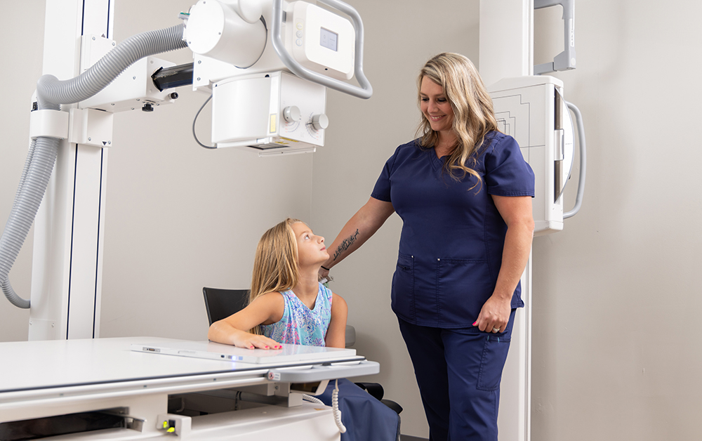 girl receiving x-ray on arm